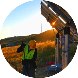 Expert technician constructing off-grid solar and storage facilty for government photovoltaic systems